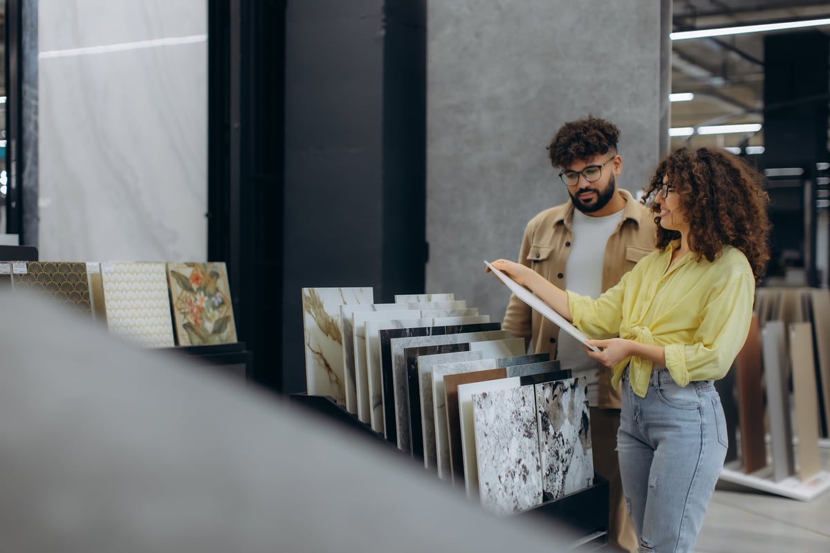 Homeowners selecting tile finishes for a residential renovation project